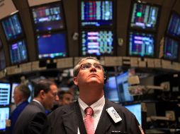 La declaración húngara puso a sufrir ayer a las bolsas. La neoyorquina perdió más de tres puntos porcentuales. AFP  /