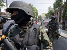 La lucha contra el narcotráfico ha dejado al menos 23 mil muertos desde el 2006. AFP  /