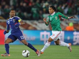 El jugador del Tricolor, Giovani dos Santos (der.). AFP  /