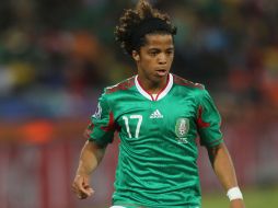 Giovani dos Santos no tuvo muchas oportunidades en el juego ante Uruguay. GETTY IMAGES SPORTS  /