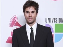 La canción de ''Cuando me enamoro'' de Iglesias está en los primeros lugares de popularidad. AP  /