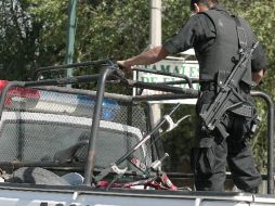 Personal de Policía del Estado participa en el operativo de búsqueda de los causantes de la agresión. ARCHIVO  /