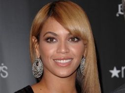 Beyoncé iba acompañada de su esposo, el rapero Jay-Z. AP  /