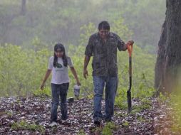 La lluvia no detuvo el ánimo de los asistentes para ayudar a la reforestación del pulmón de la ciudad. S. NÚÑEZ  /