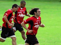 Fabricio Fuentes (der.) durante una sesión de entrenamientos. MEXSPORT  /
