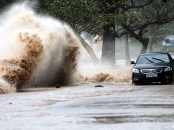 La tormenta tropical ‘‘Conson’’ amenaza con aumentar el número de víctimas en Vietnam. REUTERS  /