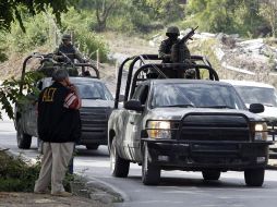 Soldados y federales protegieron la zona donde fue hallado el cuerpo del edil de Santiago, quien tenía dos días desaparecido. REUTERS  /