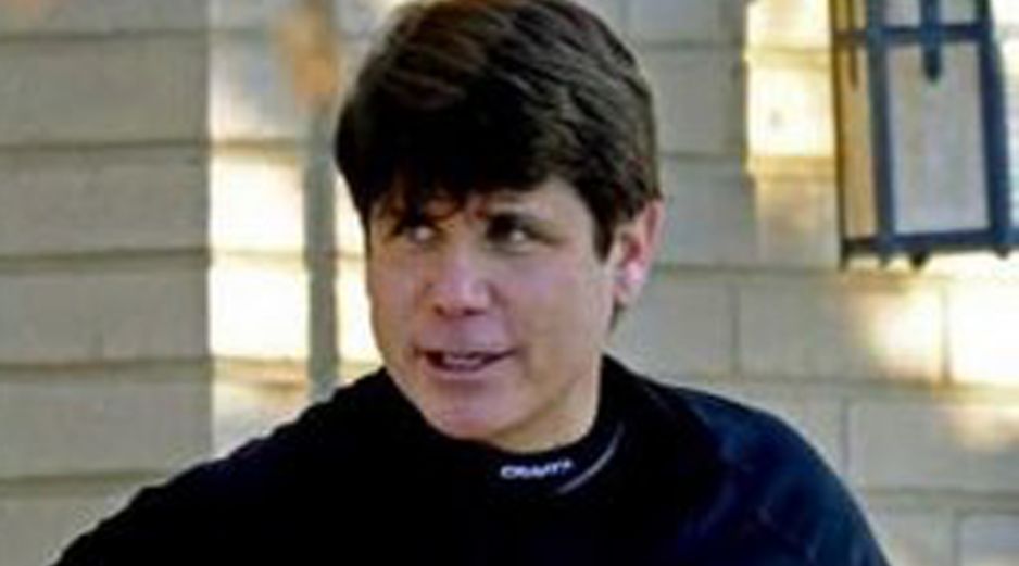 Rod Blagojevich se comparó con un superhéroe al pararse al lado de hombres disfrazados de Superman y Batman. ESPECIAL  /