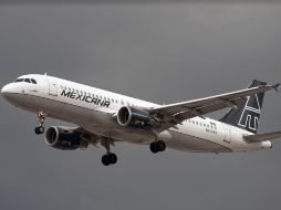 La SCJN aplazó la resolución para el caso de sobrecargos de Mexicana. AFP  /