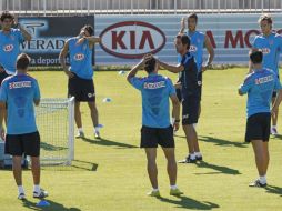 Los jugadores del Atlético de Madrid se preparan para el duelo ante el Inter de Milán. EFE  /