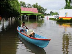 El río Carrizal se desbordó en la zona de los Sauces, como consecuencia de la crecida de seis ríos en Tabasco. NTX  /
