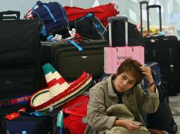 Pasajeros de Mexicana continúan varados en los aeropuertos. EFE  /