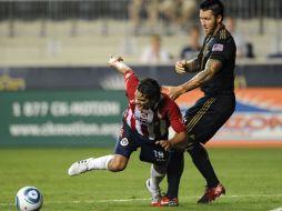 Acción del partido entre Chivas y el Unión de Filadelfia, en la imagen Xavier Báez del Guadalajara. AFP  /