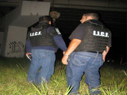 Personal del IJCF retiró los cuerpos del lugar, alparecer estaban disfrazados con un traje típico.O. RUVALCABA  /