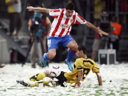 Acción del partido entre el Atlético de Madrid y el Aris Salónica. EFE.  /