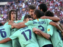 Los jugadores del Barcelona festejando su victoria. EFE  /