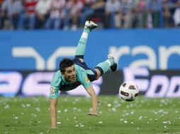 Foto de acción de David Villa durante el partido ante el Atlético de Madrid. AP  /