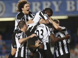 El Newcastle festeja el triunfo. AP  /