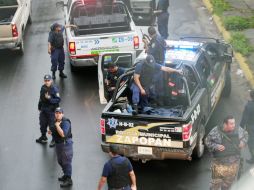 En el enfrentamiento de Periférico y la calle 5 de Mayo, varias corporaciones policiales detuvieron a cuatro individuos. E. PACHECO  /