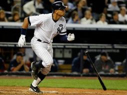 Alex Rodríguez dio una ventaja de 2-1 en la pizarra a los Yankees con su 29no cuadrangular de la temporada. AFP  /