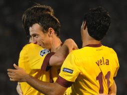 Sebastien Squillaci (cen) celebra el gol tres del Arsenal. AFP  /