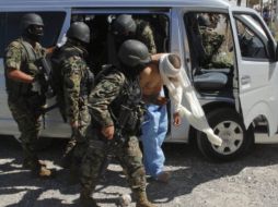 Titular de la PGR resalta la necesidad de combatir secuestros, trata de personas y narcomenudeo. AFP  /