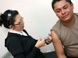 La falta de más recursos pone en riesgo avanzar en la elaboración de la vacuna contra la influenza A H1N1. ARCHIVO  /