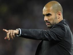 Josep Guardiola director técnico del Barcelona dirige el partido ante Mallorca. AP  /