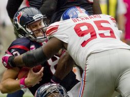 Los Gigantes  de Nueva York detienen a la defensa texana.REUTERS  /