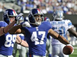 Beckum y Kevin Boss festejando la victoria de Gigantes de Nueva York. REUTERS  /