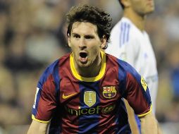 El delantero argentino Lionel Messi celebra su gol ante el Real Zaragoza. AP  /