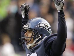 Olindo Mare de los Halcones Marinos celebra su primara anotación. AP  /