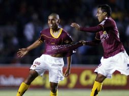 Daniel Cisneros (c) anotó un golazo en la victoria ante Toluca. MEXSPORT  /