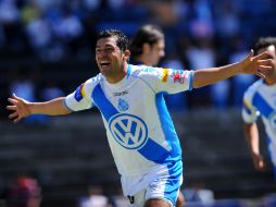 Jesús Ayala celebrando su anotación con lo que el Puebla comenzaba a ganar. JAMMEDIA  /