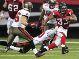 Turner acarreó el balón en 24 ocasiones para ganancia de 107 yardas. AP  /