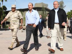 El Presidente Calderón (centro) acudirá a la asamblea, de la SIP, donde emitirá el mensaje de inauguración. NTX  /