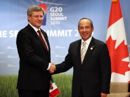 El Presidente Felipe Calderón (derecha) y el primer ministro de Canadá, Stephen Harper, durante la reunión bilateral. EL UNIVERSAL  /
