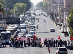 El ia jueves bloqueó la UdeG más de 100 cruceros viales en la ciudad por espacio de tres a cinco minutos. A. GARCÍA  /