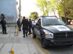 Al lugar acudieron agentes invetigadores de la Procuraduría estatal para realizar las indagatorias del atraco. O. RUVALCABA  /