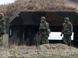 Marinos surcoreanos en isla de Pyongyang. EFE  /