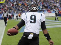 David Garrard, el mariscal de campo de los Jaguares, festejó después de anotar un touchdown. AP  /