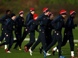 Los jugadores del Arsenal realizan una sesión de entrenamientos. AP  /