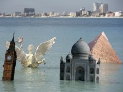 Activistas de Greenpeace se manifiestan en Cancún en exigencia de acciones concretas contra el cambio climático. REUTERS  /
