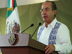 Calderón fungió como líder en algunas reuniones de la Cumbre de Cancún, lo que fue reconocido por Barack Obama. AFP  /