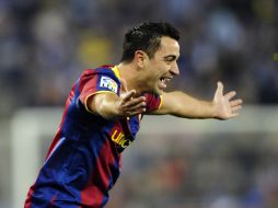 Xavi Hernández causa polémica con sus declaraciones en torno a Mourinho y Guardiola. AP  /