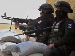 Agentes federales están a cargo de la búsqueda de su compañero. AFP  /