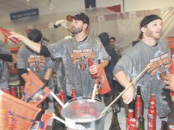 Los Gigantes de San Francisco celebraron con cerveza su título de la Serie Mundial. GETTY IMAGES SPORT  /