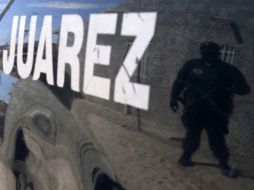 Los policías fueron sorprendidos por  sicarios y repelieron la agresión para salvar sus vidas.  REUTERS  /