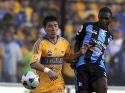 Querétaro no supo mantener el marcador a su favor y Tigres terminó consiguiendo el empate. MEXSPORT  /