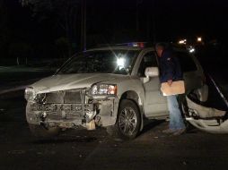 Camioneta Mitsubishi en la que viajaba el hombre que fue acribillado, cuando circulaba por calles de Tlajomulco. O. RUVALCABA  /